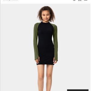 Black casual athleisure dress. Made with yoga pant material,shorts phone pocket